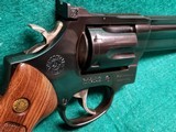 TAURUS - 669 COMP. DOUBLE ACTION REVOLVER. BLUED. 4" PORTED BARREL. W-ORIGINAL BOX AND OWNERS MANUAL. EXCELLENT CONDITION! - .357 MAGNUM - 9 of 18