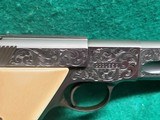 Colt - WOODSMAN. MATCH TARGET. 3RD MODEL. 4.5" BARREL. IVORY GRIPS. EXQUISITELY ENGRAVED BY MASTER ENGRAVER CLINT FINLEY. MFG IN 1972 - .22 LR - 17 of 26