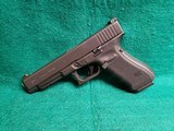 GLOCK - 35GEN4 MOS. 5" GS AFTERMARKET BARREL AND GUIDE ROD. TRIJICON HD FRONT SIGHT. W-ONE MAGAZINE. NEAR MINT! - .40 S&W - 5 of 16