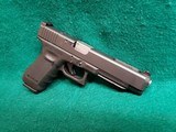 GLOCK - 35GEN4 MOS. 5" GS AFTERMARKET BARREL AND GUIDE ROD. TRIJICON HD FRONT SIGHT. W-ONE MAGAZINE. NEAR MINT! - .40 S&W - 3 of 16