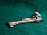 COLT - NEW FRONTIER S.A.A. 3RD GEN. NICKEL PLATED. 7.5" BBL. ENGRAVED BY BRIAN MEARS. CHECKERED IVORY GRIPS. MFG. IN 1981 - .44 SPECIAL - 11 of 18
