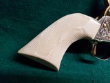 COLT - NEW FRONTIER S.A.A. 3RD GEN. NICKEL PLATED. 7.5" BBL. ENGRAVED BY BRIAN MEARS. CHECKERED IVORY GRIPS. MFG. IN 1981 - .44 SPECIAL - 8 of 18