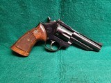 LLAMA - COMANCHE. DOUBLE ACTION REVOLVER. BLUED. 4" BARREL. NICE BORE! MFG. IN 1976 - .357 MAGNUM - 1 of 19