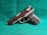 RUGER - P89. 5" EXTENDED NATIONAL MATCH BARREL W-COMP. W-MAGAZINE. NICE CONDITION. MFG. IN 2000 - 9MM LUGER - 4 of 17