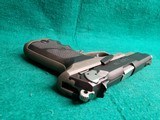 RUGER - P89. 5" EXTENDED NATIONAL MATCH BARREL W-COMP. W-MAGAZINE. NICE CONDITION. MFG. IN 2000 - 9MM LUGER - 17 of 17