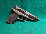 RUGER - P89. 5" EXTENDED NATIONAL MATCH BARREL W-COMP. W-MAGAZINE. NICE CONDITION. MFG. IN 2000 - 9MM LUGER - 1 of 17