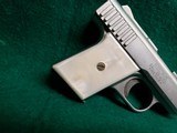 RAVEN ARMS - P-25. NICKEL. 2.5" BBL. W-MAGAZINE. FAUX PEARL GRIPS. SOLD AS-IS - .25 ACP - 7 of 15