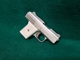 RAVEN ARMS - P-25. NICKEL. 2.5" BBL. W-MAGAZINE. FAUX PEARL GRIPS. SOLD AS-IS - .25 ACP - 3 of 15