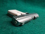 RAVEN ARMS - P-25. NICKEL. 2.5" BBL. W-MAGAZINE. FAUX PEARL GRIPS. SOLD AS-IS - .25 ACP - 15 of 15