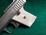 RAVEN ARMS - P-25. NICKEL. 2.5" BBL. W-MAGAZINE. FAUX PEARL GRIPS. SOLD AS-IS - .25 ACP - 11 of 15