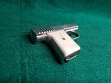 RAVEN ARMS - P-25. NICKEL. 2.5" BBL. W-MAGAZINE. FAUX PEARL GRIPS. SOLD AS-IS - .25 ACP - 14 of 15