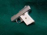 RAVEN ARMS - P-25. NICKEL. 2.5" BBL. W-MAGAZINE. FAUX PEARL GRIPS. SOLD AS-IS - .25 ACP - 6 of 15