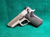 SMITH & WESSON - 4513TSW TACTICAL. DA/SA. 3.5" BBL. IN ORIGINAL CASE. W-MAGAZINE. GOOD CONDITION. MFG. IN 2003 - .45 ACP - 5 of 18