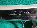 COLT - 1911 GOVERNMENT. SERIES 80. W-MAG. *RARE FACTORY ULTIMATE BRIGHT STAINLESS FINISH* MFG. IN 1996. IN CASE. VERY NICE! - .45 ACP - 15 of 19