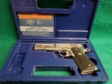 COLT - 1911 GOVERNMENT. SERIES 80. W-MAG. *RARE FACTORY ULTIMATE BRIGHT STAINLESS FINISH* MFG. IN 1996. IN CASE. VERY NICE! - .45 ACP - 19 of 19