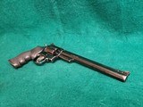 SMITH & WESSON - MODEL 53. BLUED. 8.38" BARREL. PINNED AND RECESSED. MINTY BORE! MFG. IN 1961. W-AMMUNITION - .22 REM. JET - 14 of 21