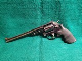 SMITH & WESSON - MODEL 53. BLUED. 8.38" BARREL. PINNED AND RECESSED. MINTY BORE! MFG. IN 1961. W-AMMUNITION - .22 REM. JET - 4 of 21