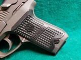 RUGER - P94DC. 4" BARREL. W-ONE 10 ROUND MAGAZINE. NICE BORE! MFG. IN 1997 - .40 S&W - 16 of 17