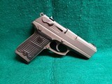 RUGER - P94DC. 4" BARREL. W-ONE 10 ROUND MAGAZINE. NICE BORE! MFG. IN 1997 - .40 S&W - 1 of 17