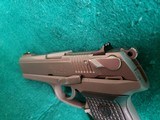 RUGER - P94DC. 4" BARREL. W-ONE 10 ROUND MAGAZINE. NICE BORE! MFG. IN 1997 - .40 S&W - 11 of 17