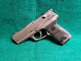 RUGER - P94DC. 4" BARREL. W-ONE 10 ROUND MAGAZINE. NICE BORE! MFG. IN 1997 - .40 S&W - 4 of 17