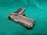 RUGER - P94DC. 4" BARREL. W-ONE 10 ROUND MAGAZINE. NICE BORE! MFG. IN 1997 - .40 S&W - 12 of 17