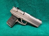 RUGER - P94DC. 4" BARREL. W-ONE 10 ROUND MAGAZINE. NICE BORE! MFG. IN 1997 - .40 S&W - 2 of 17