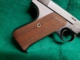 COLT - WOODSMAN. 1ST SERIES. 6.5" BARREL. NEAR MINT IN ORIGINAL BOX W-PAPERS. MFG. IN 1936 - .22 LR - 7 of 23