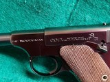 COLT - WOODSMAN. 1ST SERIES. 6.5" BARREL. NEAR MINT IN ORIGINAL BOX W-PAPERS. MFG. IN 1936 - .22 LR - 12 of 23