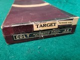 COLT - WOODSMAN. 1ST SERIES. 6.5" BARREL. NEAR MINT IN ORIGINAL BOX W-PAPERS. MFG. IN 1936 - .22 LR - 22 of 23