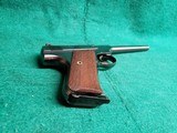 COLT - WOODSMAN. 1ST SERIES. 6.5" BARREL. NEAR MINT IN ORIGINAL BOX W-PAPERS. MFG. IN 1936 - .22 LR - 16 of 23