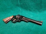 SMITH & WESSON - MODEL 1950 TARGET (PRE-MODEL 24). 6.5" BBL. MFG. CIRCA 1955/56. NEAR MINT WITH BRIGHT BLUED ORIGINAL FINISH! - .44 SPL - 12 of 22
