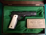 COLT - NAVY MODEL 1911. PRE-WAR. US PROPERTY MARKED. VERY RARE PRODUCTION. MFG. IN 1913. HAND ENGRAVED W-REAL IVORY GRIPS - .45 ACP - 1 of 25