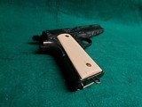 COLT - NAVY MODEL 1911. PRE-WAR. US PROPERTY MARKED. VERY RARE PRODUCTION. MFG. IN 1913. HAND ENGRAVED W-REAL IVORY GRIPS - .45 ACP - 12 of 25