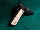 COLT - NAVY MODEL 1911. PRE-WAR. US PROPERTY MARKED. VERY RARE PRODUCTION. MFG. IN 1913. HAND ENGRAVED W-REAL IVORY GRIPS - .45 ACP - 3 of 25