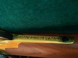 COLT FRONTIER SCOUT & WINCHESTER MODEL 94 - GOLDEN SPIKE 1869-1969 COMMEMORATIVE SET. NEAR MINT. UNFIRED IN ORIGINAL BOXES. - .22LR & .30-30WIN - 24 of 25