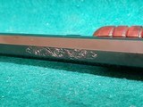 WINCHESTER - MODEL 1890. DELUXE. 24" OCTAGON BBL. ENGRAVED BY ANGELO BEE IN FACTORY #8 PATTERN. VERY GORGEOUS RIFLE! MFG. IN 1926 - .22 LR - 19 of 22