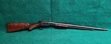 WINCHESTER - MODEL 1890. DELUXE. 24" OCTAGON BBL. ENGRAVED BY ANGELO BEE IN FACTORY #8 PATTERN. VERY GORGEOUS RIFLE! MFG. IN 1926 - .22 LR - 1 of 22