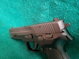 SIG SAUER - P226. GERMAN MADE. 4.5" BBL. IN ORIGINAL CASE W-OWNERS MANUAL & TEST TARGET. W-1 MAG. MFG. CIRCA 1996. NEAR MINT!- 9MM - 16 of 19