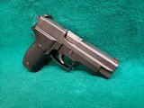 SIG SAUER - P226. GERMAN MADE. 4.5" BBL. IN ORIGINAL CASE W-OWNERS MANUAL & TEST TARGET. W-1 MAG. MFG. CIRCA 1996. NEAR MINT!- 9MM - 4 of 19