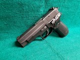 SIG SAUER - P226. GERMAN MADE. 4.5" BBL. IN ORIGINAL CASE W-OWNERS MANUAL & TEST TARGET. W-1 MAG. MFG. CIRCA 1996. NEAR MINT!- 9MM - 6 of 19