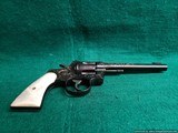 Colt - OFFICERS MODEL. HEAVY BARREL. 6