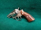 Ruger - POLICE SERVICE-SIX. STAINLESS. 2.5". BEAUTIFULLY ENGRAVED BY CLINT FINLEY. NICE BORE! MFG. IN 1977 - .357 Magnum - 6 of 22