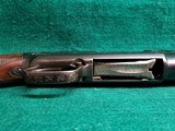 WINCHESTER - MODEL 12. 30" SIMMONS VENT RIB BARREL. BEAUTIFUL OGAWA STYLE ENGRAVING W-CARVED STOCK. MFG. IN 1941. MINTY BORE! - 12 GA - 17 of 22