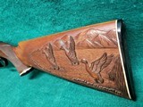 WINCHESTER - MODEL 12. 30" SIMMONS VENT RIB BARREL. BEAUTIFUL OGAWA STYLE ENGRAVING W-CARVED STOCK. MFG. IN 1941. MINTY BORE! - 12 GA - 18 of 22