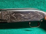 WINCHESTER - MODEL 12. 30" SIMMONS VENT RIB BARREL. BEAUTIFUL OGAWA STYLE ENGRAVING W-CARVED STOCK. MFG. IN 1941. MINTY BORE! - 12 GA - 19 of 22