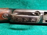 WINCHESTER - MODEL 12. 30" SIMMONS VENT RIB BARREL. BEAUTIFUL OGAWA STYLE ENGRAVING W-CARVED STOCK. MFG. IN 1941. MINTY BORE! - 12 GA - 22 of 22