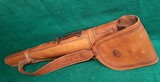 SIXKILLER CUSTOM HIGH QUALITY TOOLED LEATHER RIFLE/SHOTGUN SCABBARD BY W. OSTIN. 39 INCHES LONG - 4 of 12