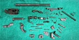 SPRINGFIELD ARMORY - XD-9. PARTS LOT. INCLUDES: TRIGGER, PINS, SPRINGS. AND MISC. SMALL PARTS - 9MM - 1 of 3