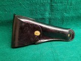 SERVICE MFG. CO - YONKERS, NY. 1911. 5 INCH. LEATHER LINED PLASTIC SWIVEL HOLSTER. ORIGINAL MILITARY MP/NYPD POLICE ISSUE. MODEL# 2425 - .45 ACP